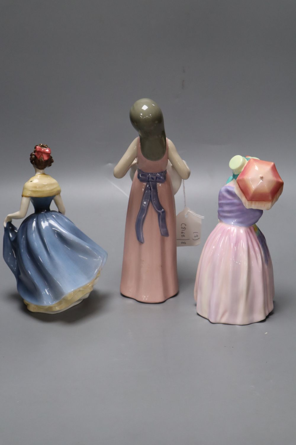 Two Royal Doulton figures and one Lladro figure (3)